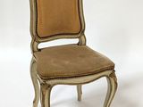 an image of a chair on a white background with a brown seat