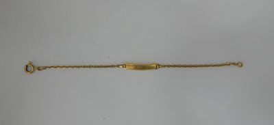 a gold bracelet with a clasp on a white background