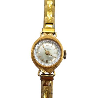 an image of a close up of a watch on a white background
