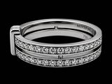 a close up of a diamond ring on a black background