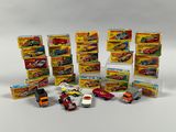 a lot of toy cars that are sitting on a table