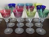 a lot of wine glasses sitting on a table