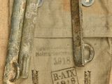 a pair of scissors sitting on top of a canvas bag
