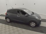 an image of a small car parked in a garage