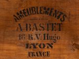 an old wooden box with a label on it