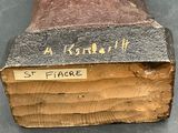 a wooden box with a sign on it that says a kind of place