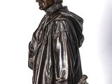 a statue of a man with a sword in his hand