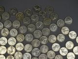 a lot of coins that are on the table