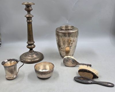a lot of silver items that are on the table