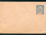 une vieille carte postale sur laquelle figure la photo d'une femme