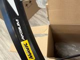 a box with a bike tire in it and a box with a bike tire in it