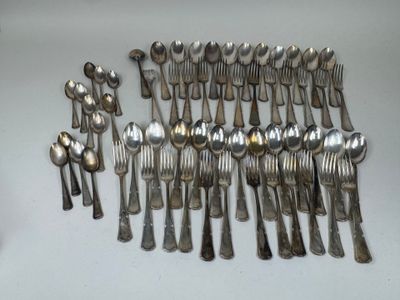 a lot of silver spoons and spoon spoons on a table