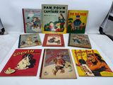 cinq bandes dessinées pour enfants sont alignées sur une table