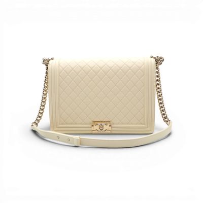 a chanel beige quilted leather shoulder bag with gold hardware