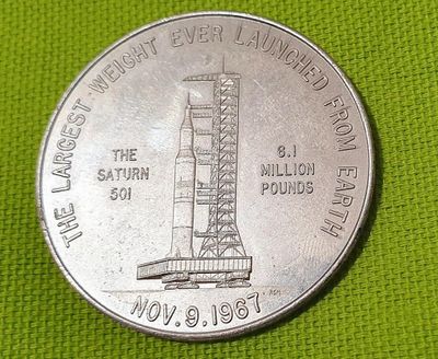 une pièce d'argent sur laquelle est représentée une tour