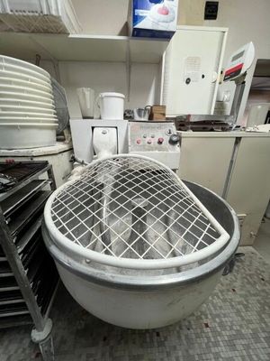 an image of a kitchen with a large bowl of food