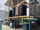a large storage rack with a lot of barrels on it