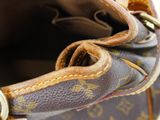 a close up view of a purse with a handle
