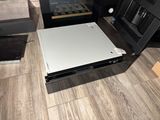 an image of a laptop computer sitting on top of a wooden floor