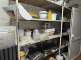 a room with a lot of items on the shelves