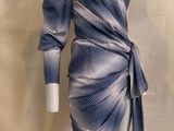 a mannequin mannequin wearing a blue and white dress on a mannequin mannequin mannequin mannequin mannequin manne