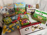 many toys and games on the table for children to play