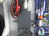 an image of a garage with tools hanging on the wall