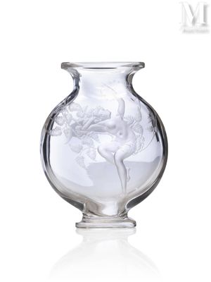 a glass vase with a picture of a woman on it