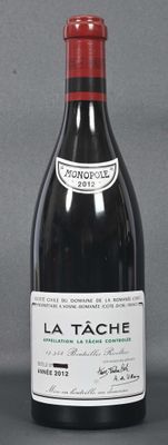 a bottle of wine that is sitting on a table