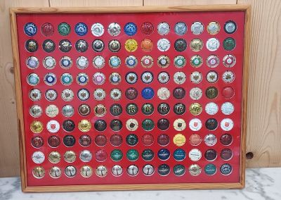 a picture of a picture of a display of beer bottle caps
