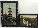 two framed pictures of asian architecture on the wall