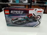 a box of lego speed formula racing cars on a table