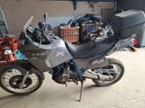 a motorcycle that is parked in a garage