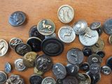 a lot of buttons that are on a table