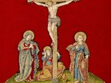 an image of a crucif with jesus on the cross and three other people