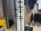 a display of sunglasses and other clothing in a store