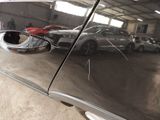a reflection of a car in the side mirror of a car