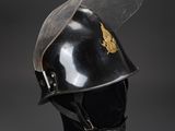 an old helmet with a clear vise on top of it