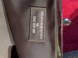 a close up of a purse with a label on it