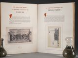a book open to a page with a picture of a machine in it