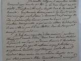 un gros plan d'un morceau de papier sur lequel on a écrit