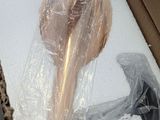 a box with a plastic object inside of it that is wrapped in plastic