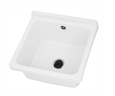 L'évier est blanc et dispose d'un siphon pour le robinet.