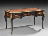 un bureau ancien à deux tiroirs avec un plateau en marbre