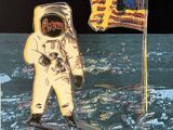 painting of an astronaut standing on the moon with a flag in the background