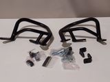 pair of black motorcycle handlebars with screws and nuts