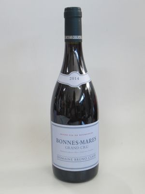 a bottle of wine that is sitting on a table