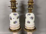 pair of antique porcelain candlesticks with purple flowers and gold trim