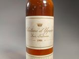 an image of a bottle of wine sitting on top of a table