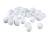 a pile of white cotton balls on a white surface
